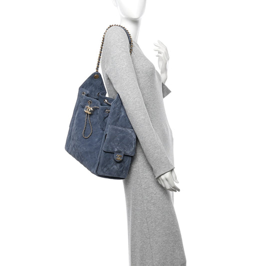 Suede Quilted Medium Chanel 25 Handbag Blue
