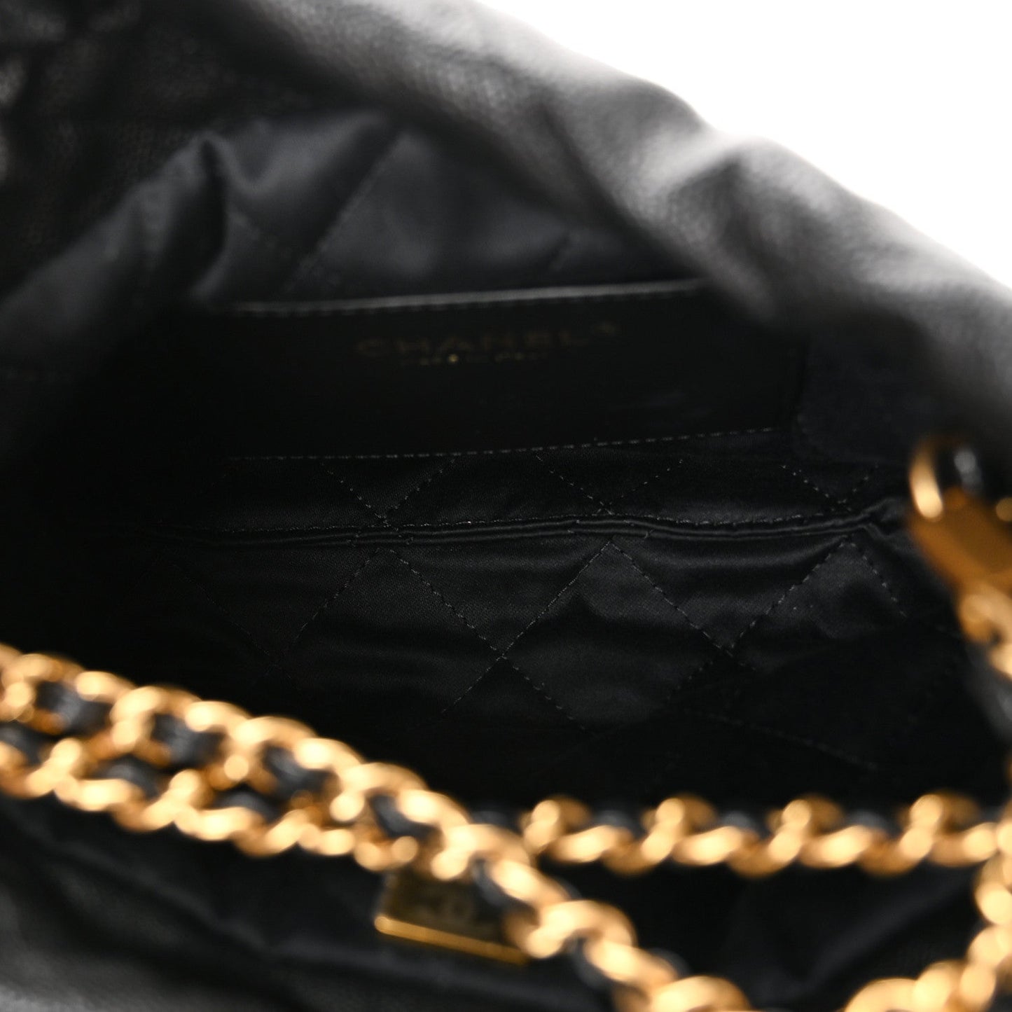 Shiny Caviar Quilted Monochrome Mini Chanel 22 Black