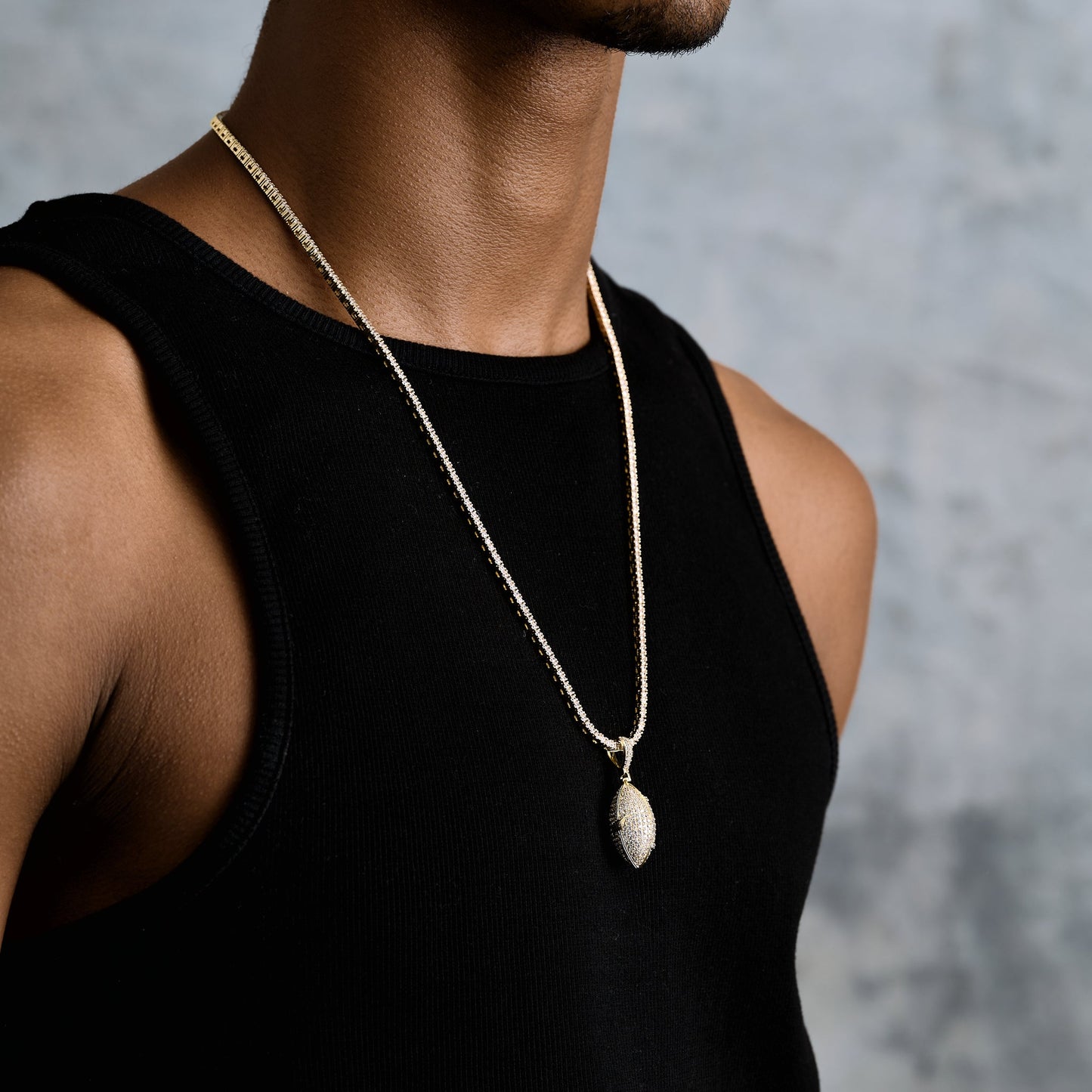 Iced Football Pendant in Yellow Gold